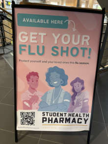 A flu shot poster at the Student Health Pharmacy.