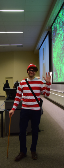 Biology professor Josh Neufeld dressed as Waldo.