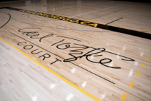 A close-up of the inscription on the court showing Carl Totzke's signature.