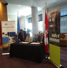 Feridun Hamdullahpur signs a Memorandum of Understanding in Montreal.