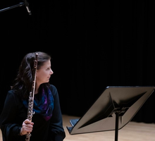 Laurel Swinden holds a flute.