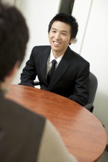 A student being interviewed for a co-op position.