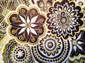 A doodle made from black and gold pens.