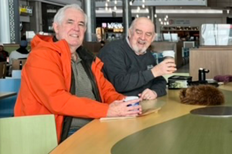 Bob Truman and Ron Champion in the Conestoga Mall Food Court in December 2024.