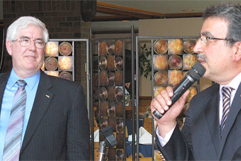 Bob Truman and Feridun Hamdullahpur at Bob's retirement party in 2010.
