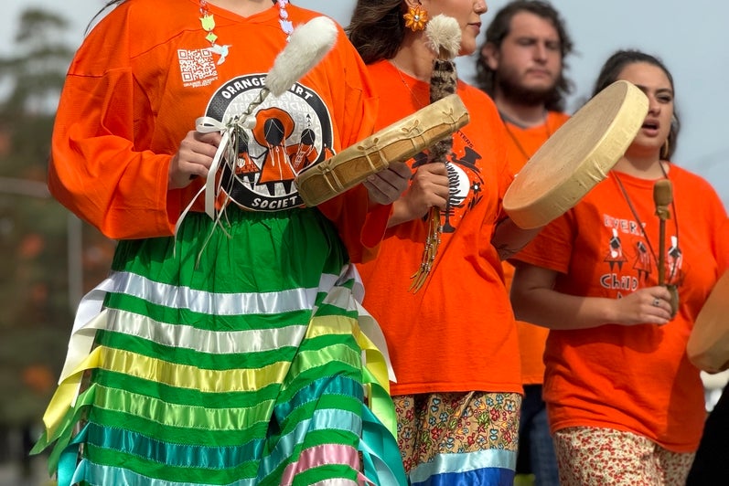 Drummers in ribbon skirts at National Day for Truth and Reconciliation