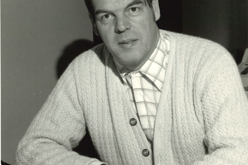 Ron Mullin sits at his desk in 1982.