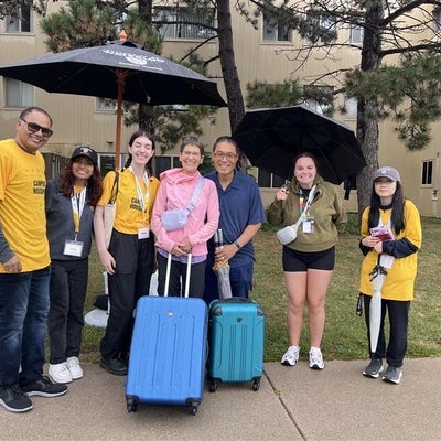 Volunteers for move in with new students