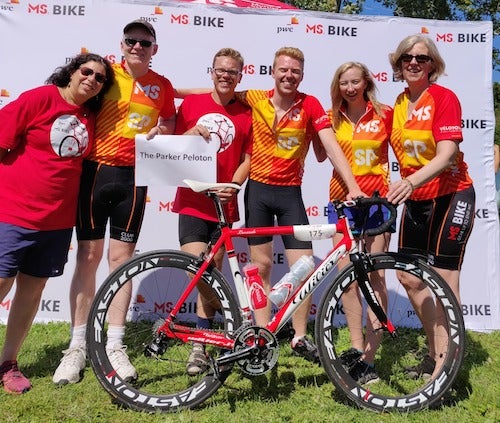 Julia Williams, Wayne Parker, their son Sam and the &quot;Parker Peloton&quot; team in racing outfits.