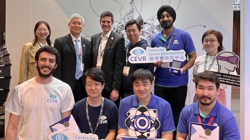 Centre for Eye and Vision Research (CEVR) personnel pose for a group photo.