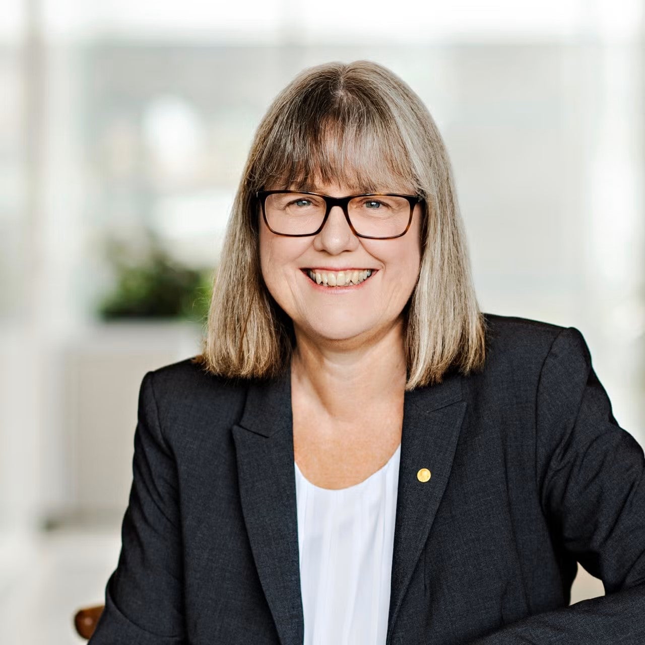 Profile shot of Donna Strickland in a black blazer