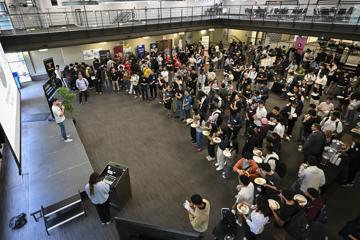 A Velocity event at Fed Hall - people watching a person on stage.