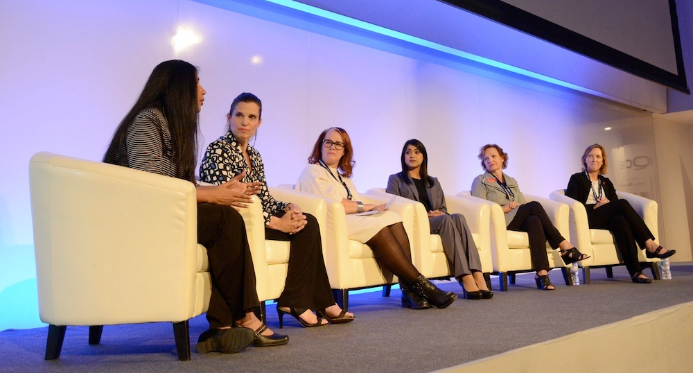 Minister Kirsty Duncan with panelists on stage at the Waterloo Innovation Summit.