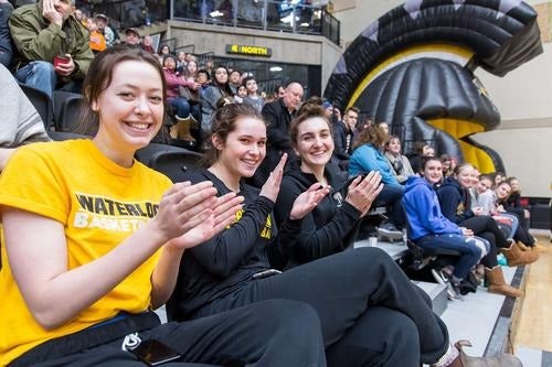 Sports fans in Warriors gear at FAD Day.