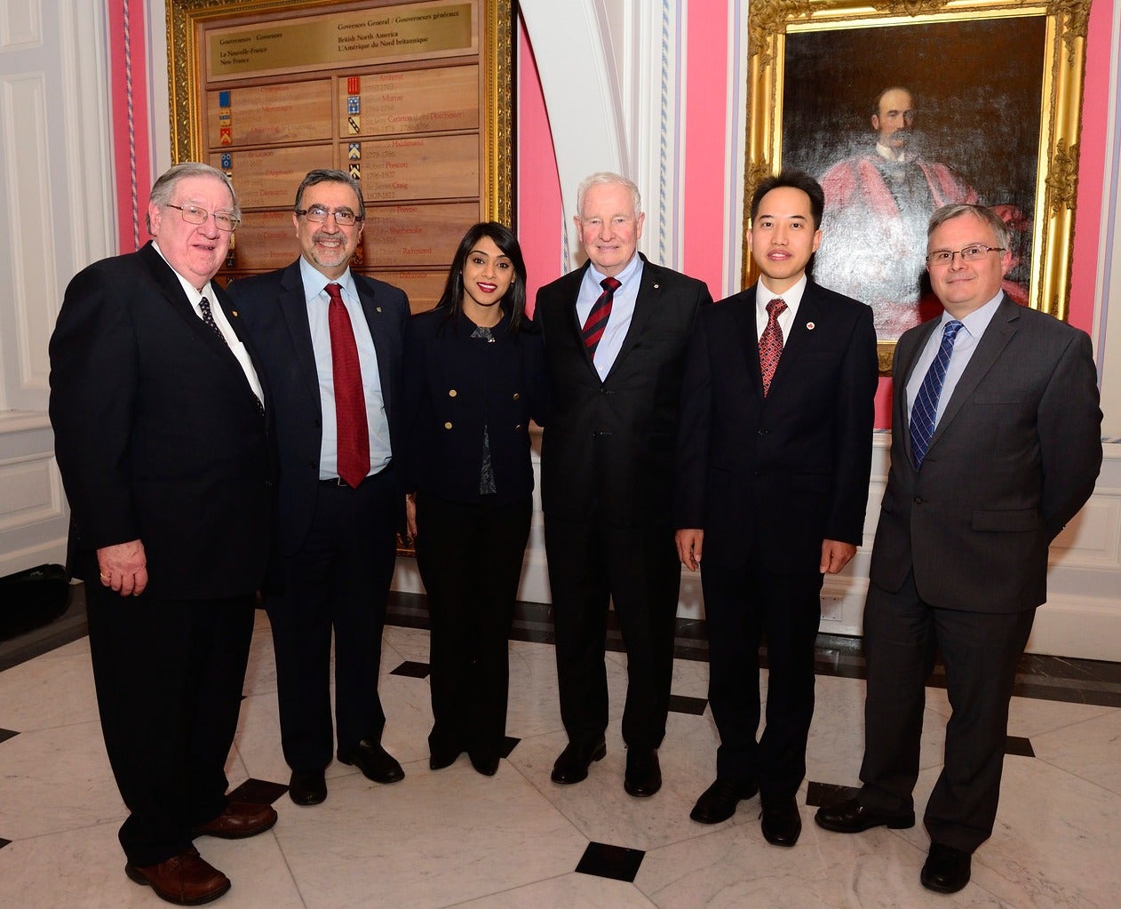 George Dixon; Feridun Hamdullahpur, Bardish Chagger; David Johnston; Zhongwei Chen, and an unidentified man stand in Rideau Hall.