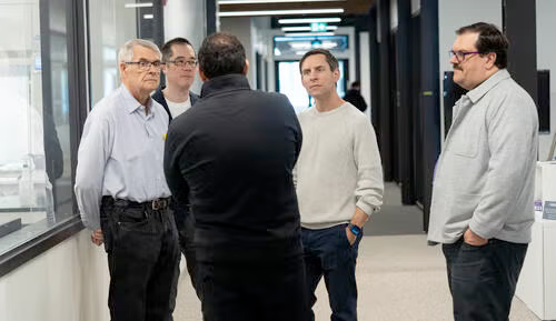 Drs. Doug and James Kavanagh with two others during a tour of Velocity.
