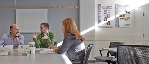 University employees engage in a brainstorming session.