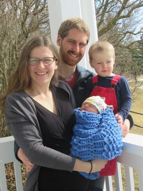  Joshua, Laura, baby Joanna and son Oran, on the front porch of the Brubacher House museum on the University's north campus.