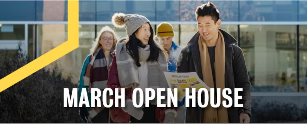 Students consult a map as they take a tour of campus.