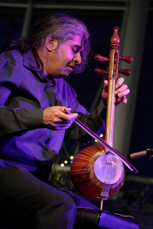 Shahriyar Jamshidi plays the kamānche instrument.