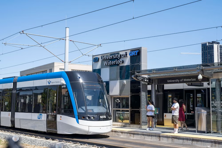An LRT vehicle pulls up to the University of Waterloo transit station.
