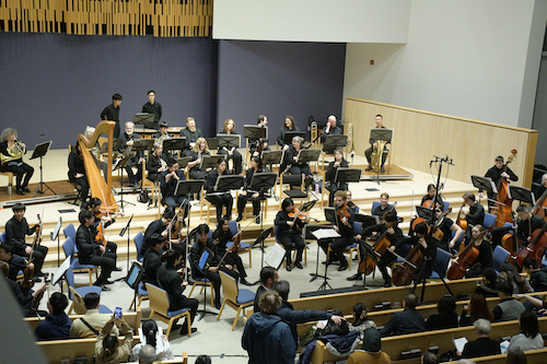 The Orchestra performs on stage.