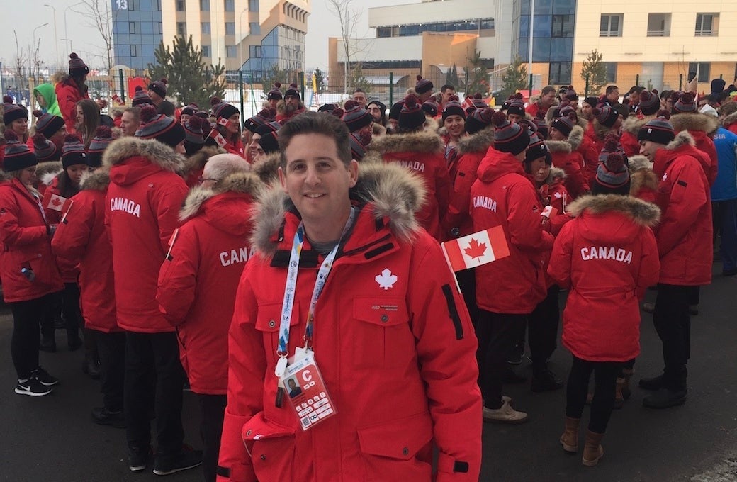 Athletics staff member Ari Grossman and other Universiade volunteers.