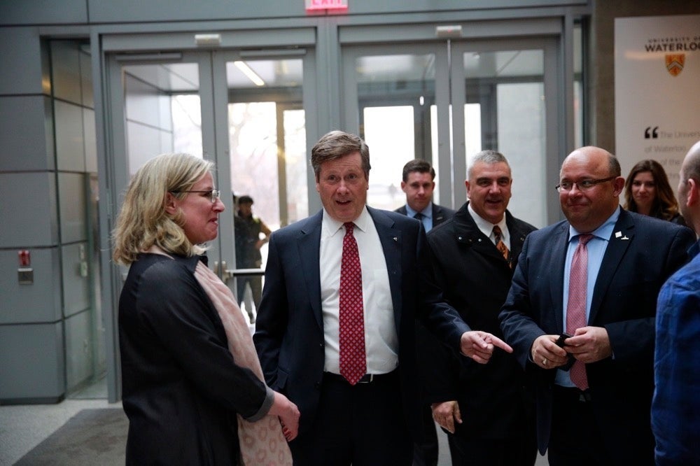 VP University Relations Sandra Banks, Toronto Mayor John Tory, Waterloo Mayor Dave Jaworsky, and Kitchener Mayor Berry Vrbanovic enter the Quantum-Nano Centre.