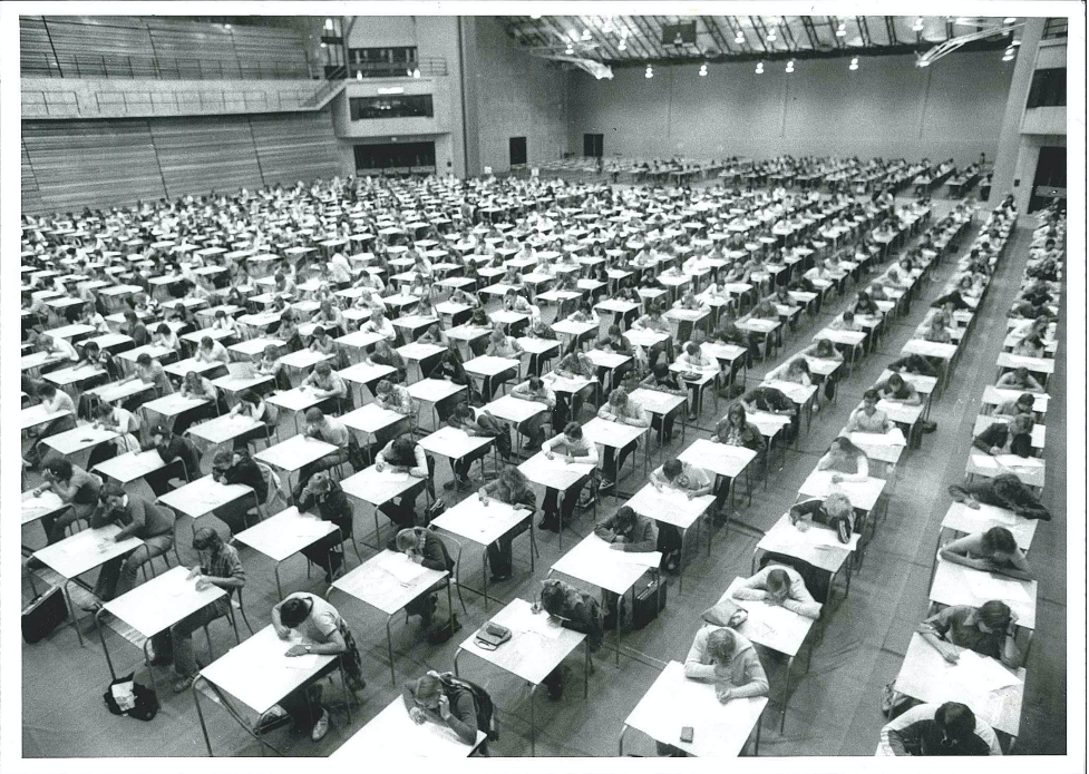 Black and white photo of desks