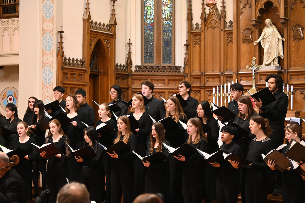 The University Choir performs in a church.