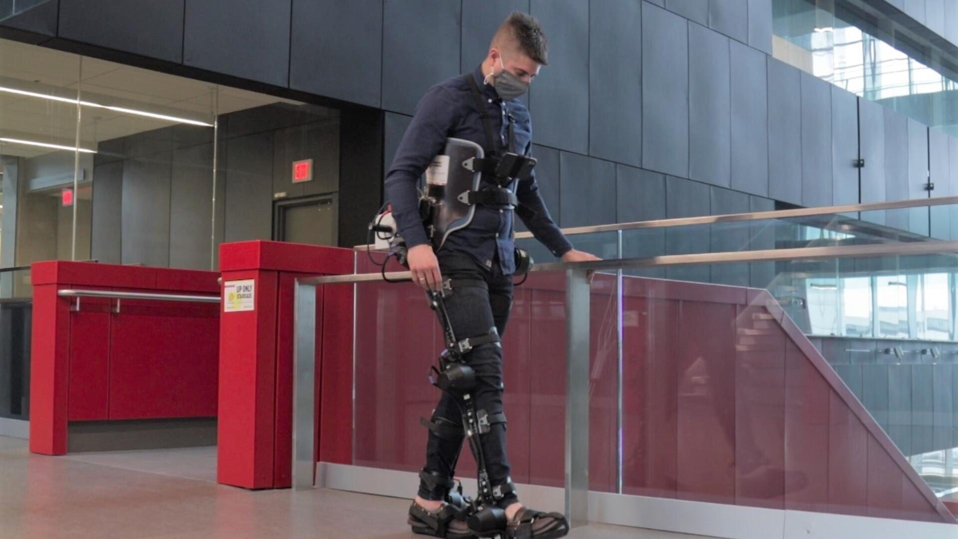 Brokoslaw Laschowski walks with the assistance of an exosuit.