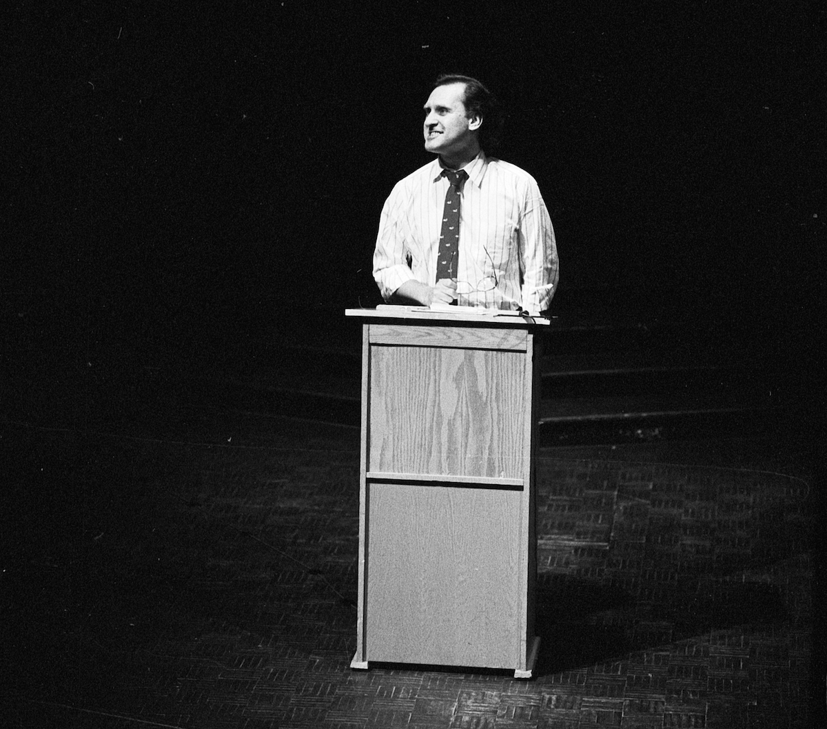 Stephen Lewis speaks at a lectern.