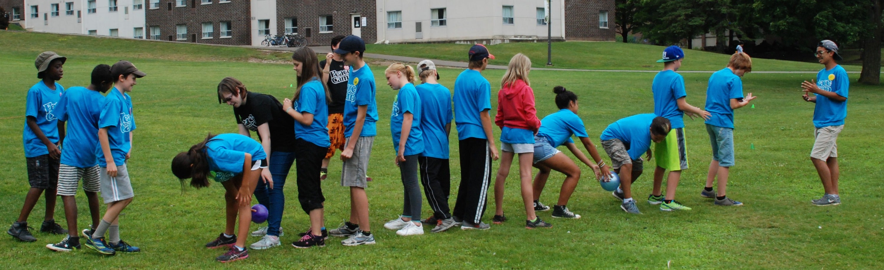 Peace Campers play a relay game.