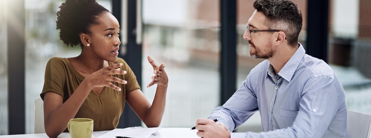 Employees having a discussion. 