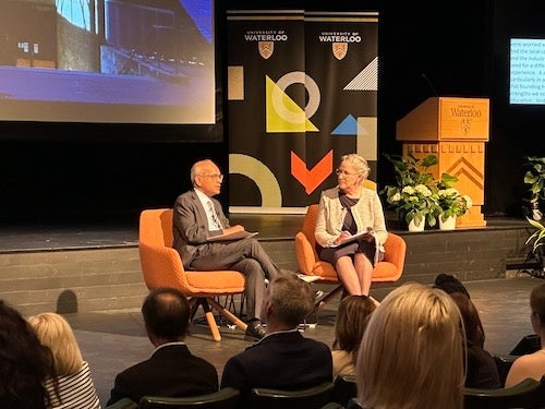 President Vivek Goel and Vice-President, University Relations Sandra Banks sit on stage during the President's Forum.