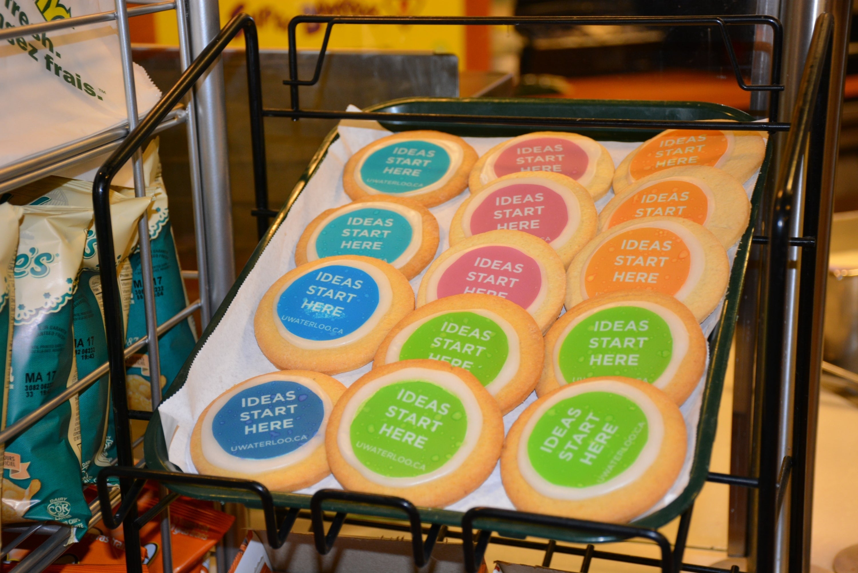 A rack of cookies with "Ideas Start Here" icing.