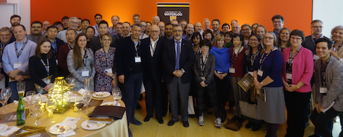 President Hamdullahpur stands with teaching and research award winners at a reception.