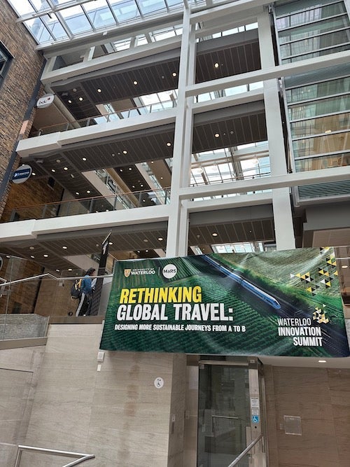 The WIS banner hangs in the Mars atrium.