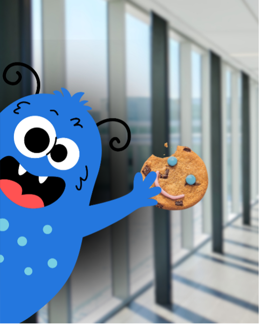 A blue cartoon monster holds a cookie with a bite out of it.