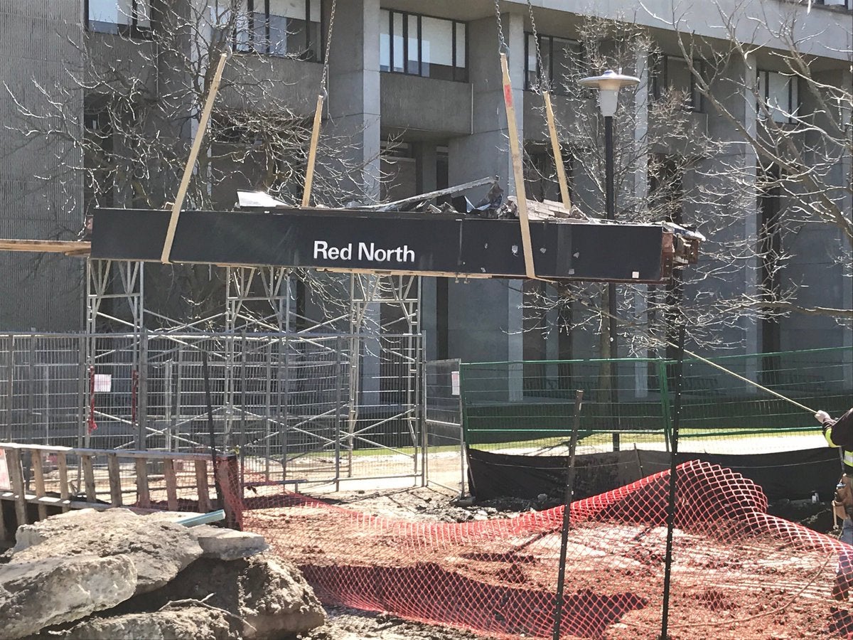 The Red North door header being removed via crane at the PAC construction site.