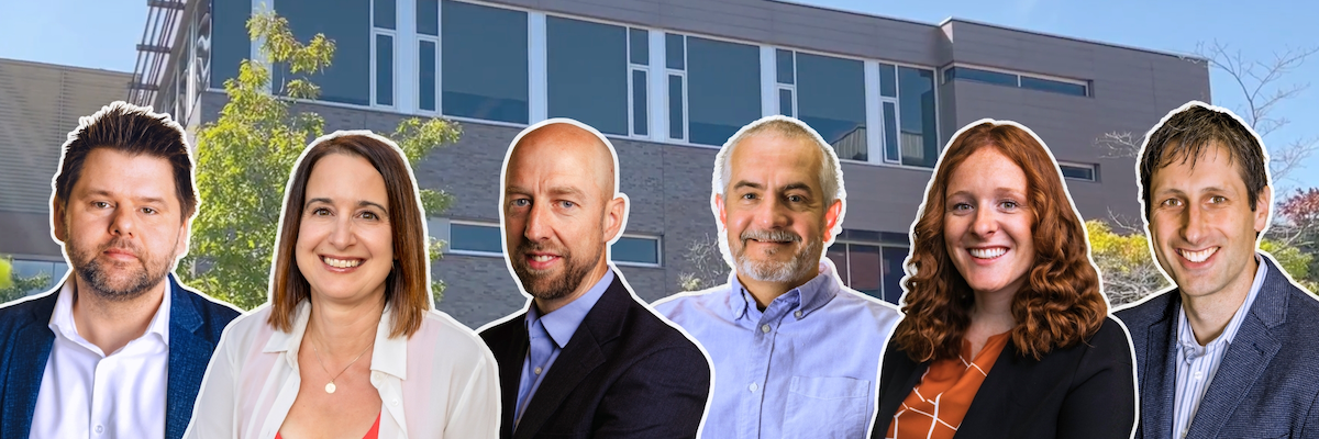 Six Waterloo researchers in front of the School of Accounting and Finance building.