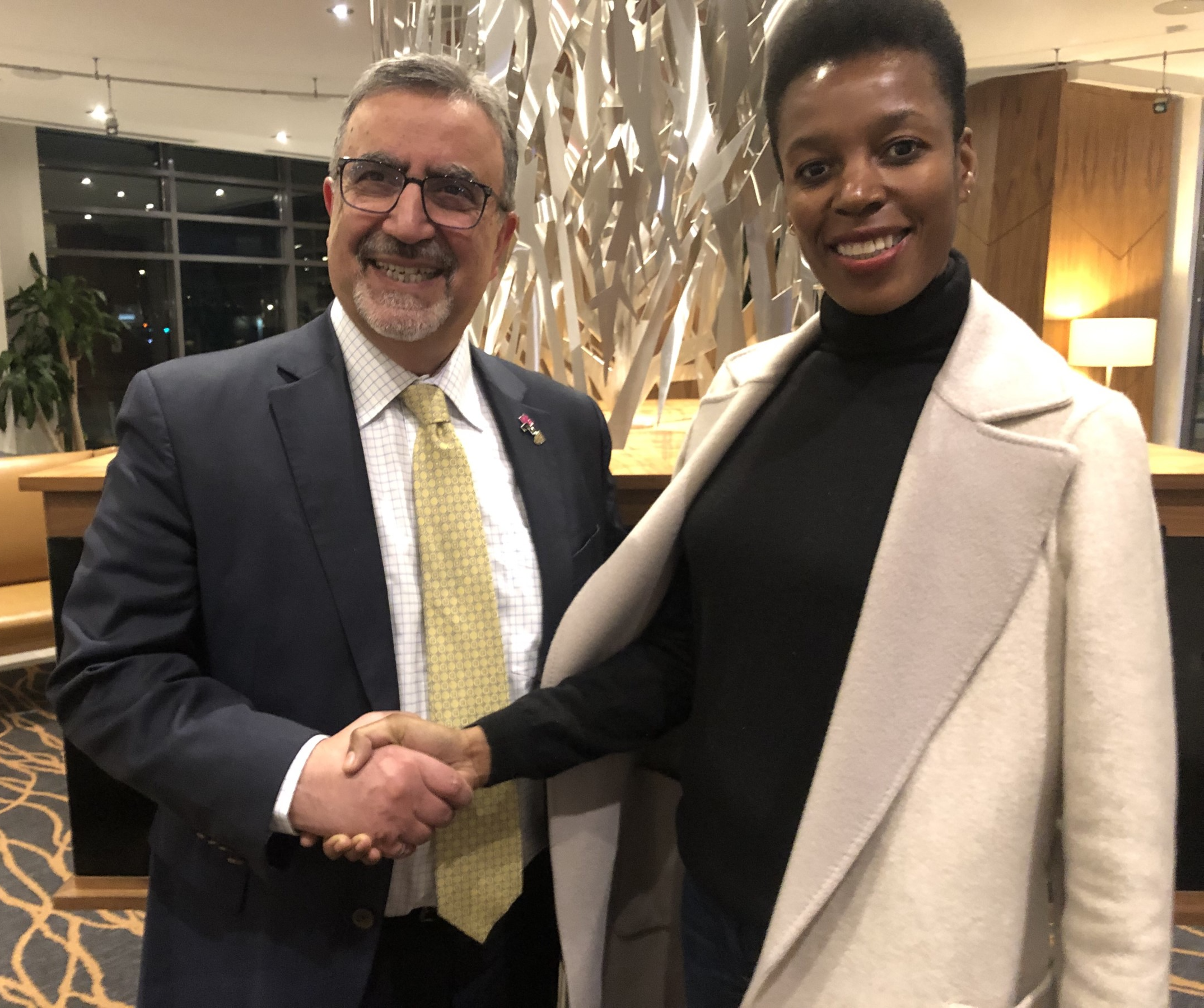 President Feridun Hamdullahpur with Elizabeth Nyamayaro.