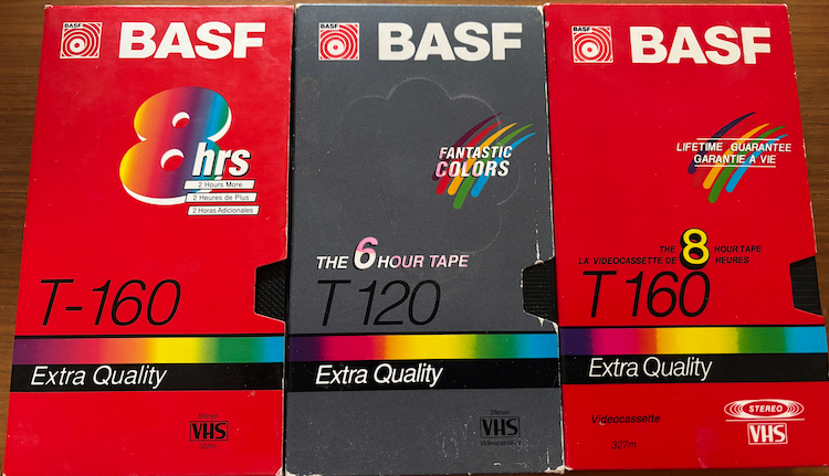 Three BASF-branded VHS tapes in their cardboard slipcovers.
