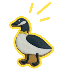 A sugar cookie in the shape of a canada goose.