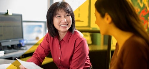 Two women in conversation.