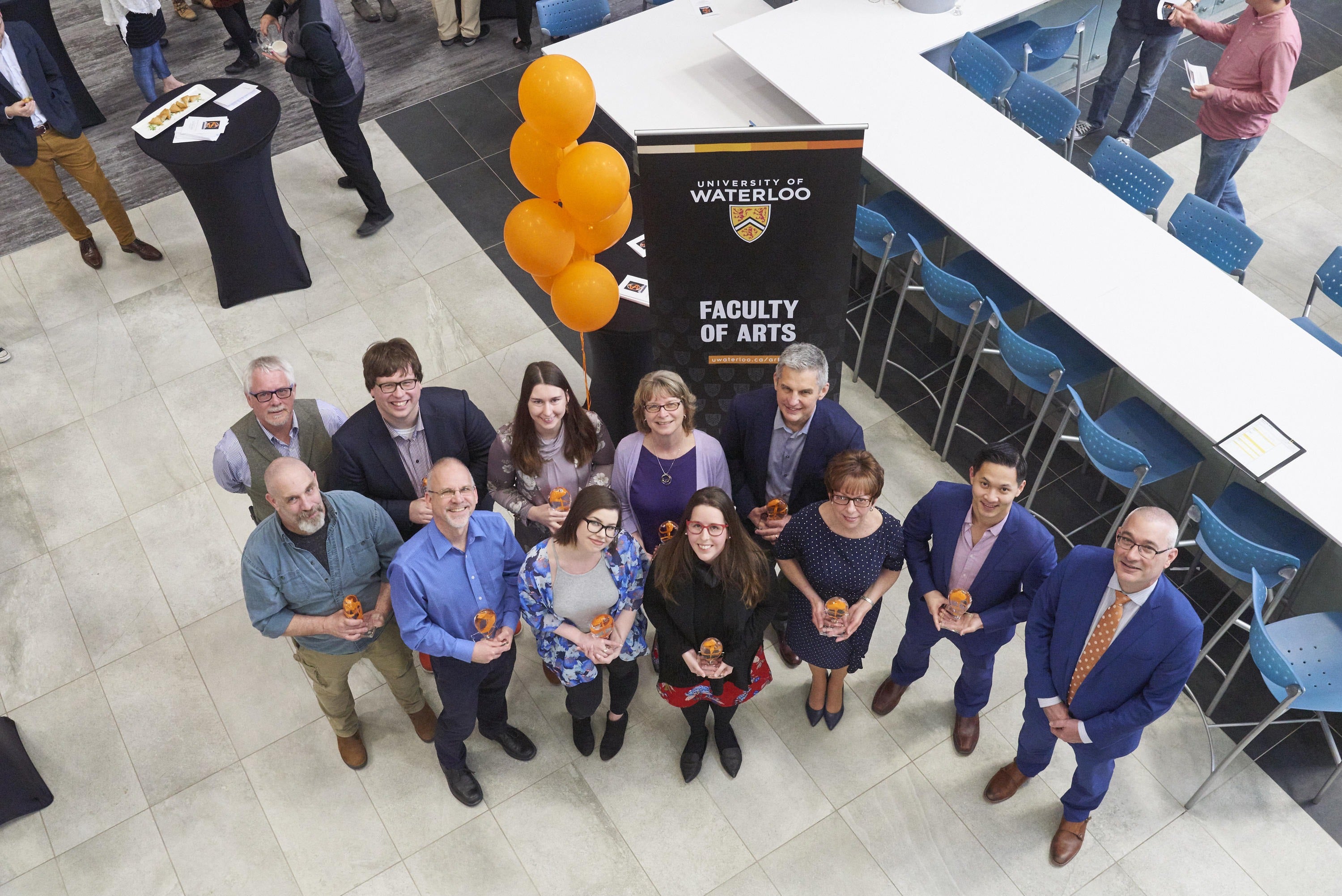 Dean of Arts Douglas Peers, Provost Jim Rush and the Arts Awards recipients in the Hagey Hub.