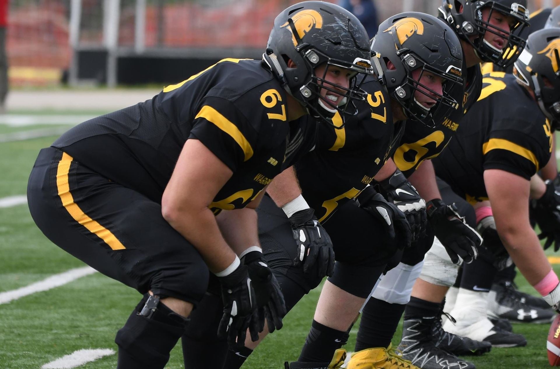 Jesse Gibbon playing football.
