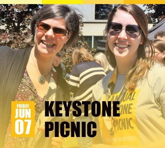 Keystone Picnic banner showing two Waterloo staff members.
