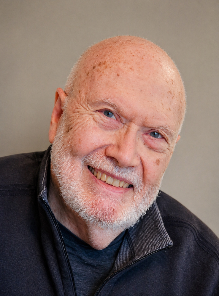 Dr. Paul Guild smiles.