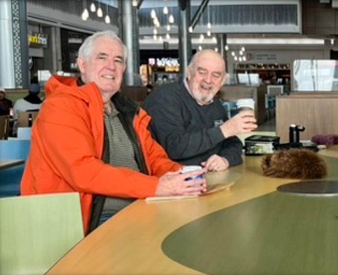 Bob Truman and Ron Champion in the Conestoga Mall Food Court in December 2024.